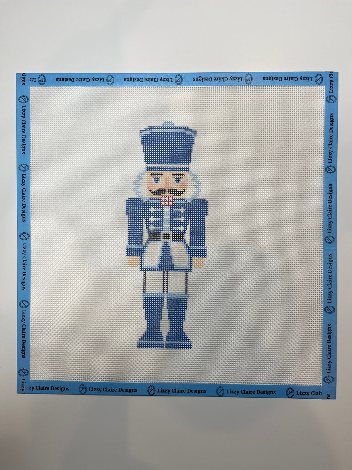 Lizzy Claire's Happy Neighborhood Large Blue Nutcracker - 13 mesh - 12 x 12 - Needlepoint Canvas